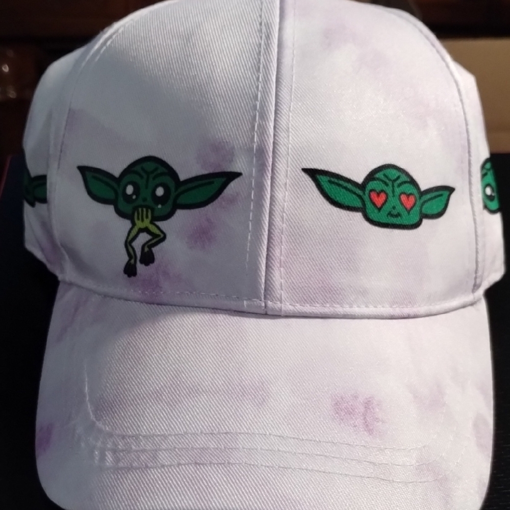 White Cap with Green Character Design